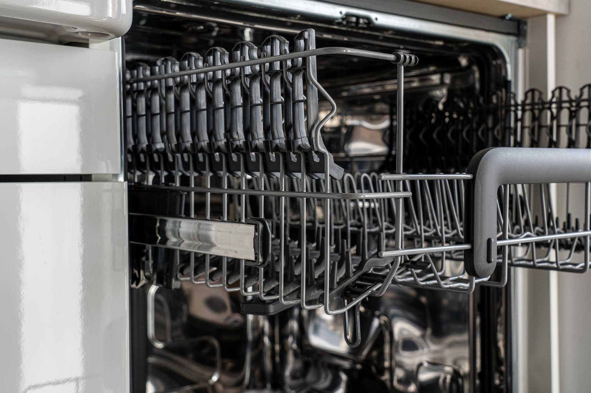 close up photo of empty dishwasher